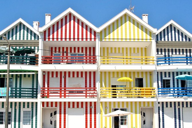 Aveiro, Costa Nova and Coimbra Private Tour From Porto - Costa Nova Fish Market and the Coastal Stop