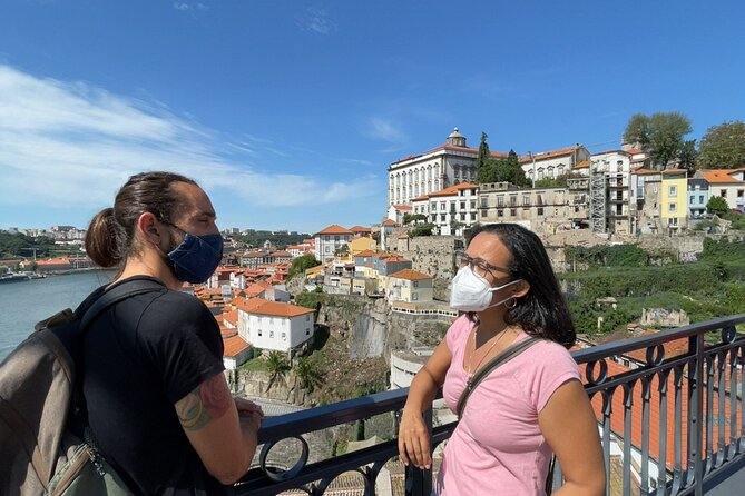 Discover Porto A Private Walking Tour with Authentic Tasting - Clérigos Tower and Porto’s unmistakable skyline