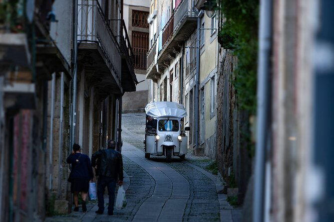 Discover Porto's Highlights on a 2-Hour Private Electric Tuk Tuk - Cordoaria and Clérigos in the historic center