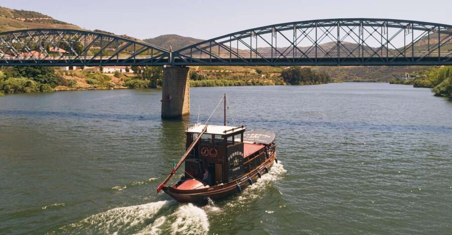 From Pinhão: Douro Valley Rabelo Boat Tour with Audio Guide - The Rabelo boat and what the ride feels like