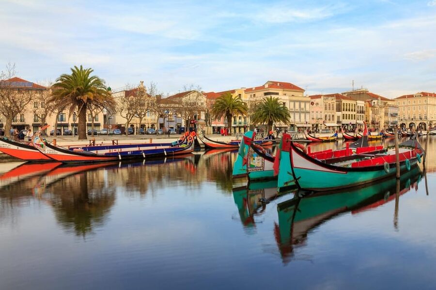 From Porto: Full-Day Trip to Coimbra & Aveiro with Boat Ride - Leaving Porto in a small air-conditioned vehicle