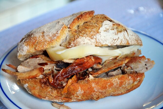 Half-Day Walking Tour Tasting Local Food in Porto - Bolhão Market brings the city’s food culture into focus