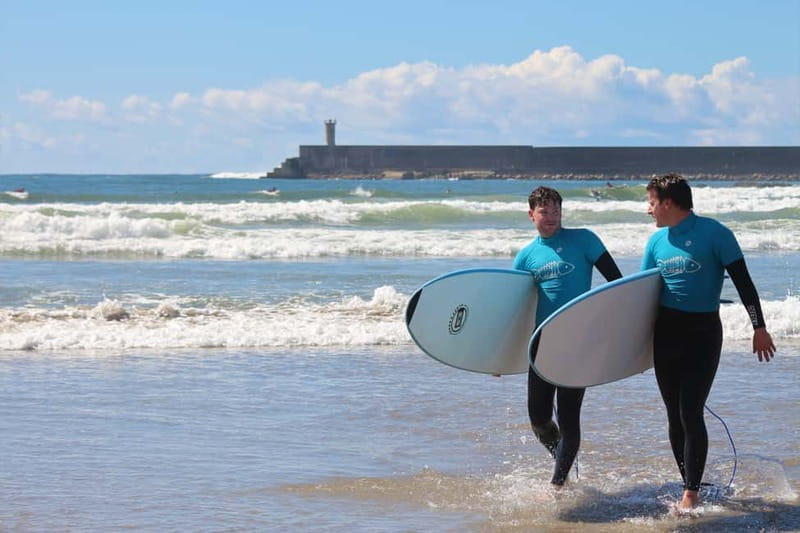 Matosinhos: Surfing Lesson with Equipment - Into the Atlantic with an instructor nearby