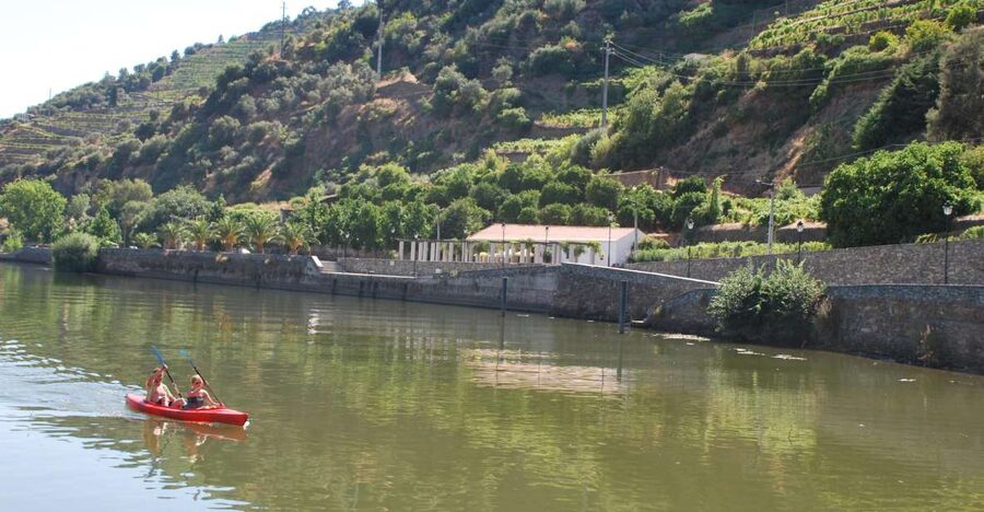 Pinhão: Douro Valley Rabelo Boat Tour and Kayak Experience - Tua marks the switch from sightseeing to work