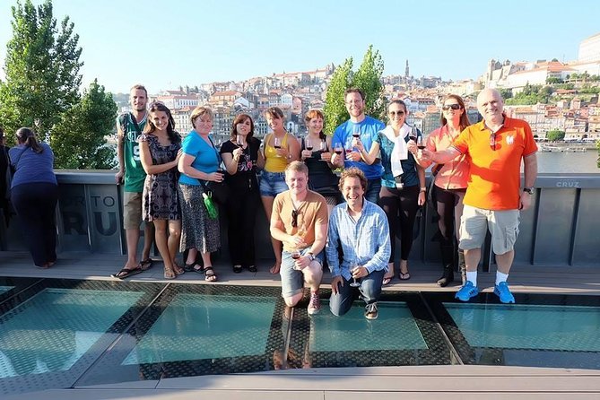 Port Wine Lodges Tour Including 7 Port Wine Tastings (English) - Old barrels, cork, and a young ruby port