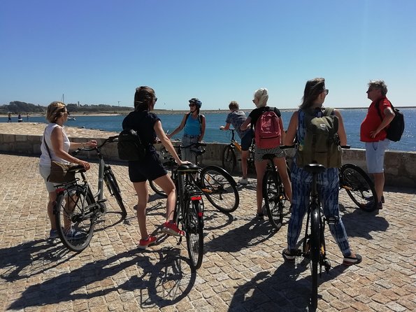 Porto: 3-Hour Old Town & Riverside Bike Tour - Guided Experience - Alfândega Nova and the riverfront’s working past
