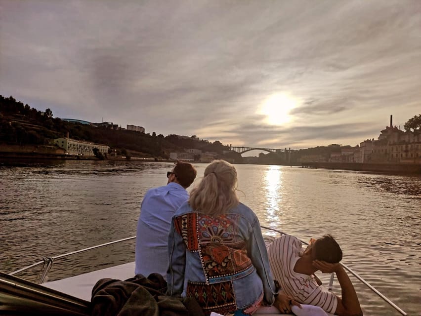 Porto: 6 Bridges and Ribeira Boat Tour with Sunset Option - Under the Dom Luís I Bridge and along Cais de Gaia
