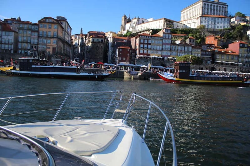 Porto: 6 Bridges Yacht Cruise with Local Wine & Snacks - Wine, Port, and a board of local food