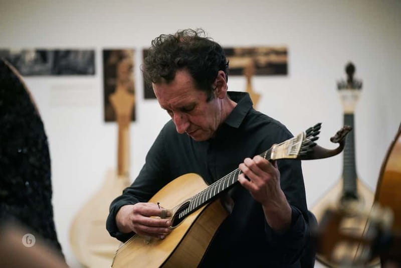 Porto: Authentic Fado Show, Port Wine & Handmade Instruments - A Fado concert inside a working guitar shop