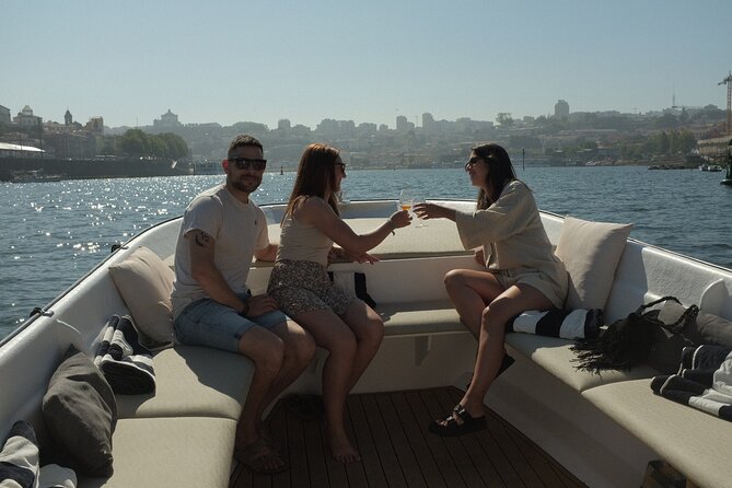 Porto: Douro River Boat Cruise with Port Wine and Snacks - Porto’s oldest bridge and the riverfront story