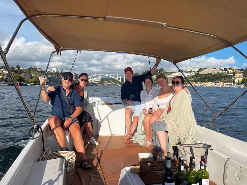 Porto: Douro River Boat Cruise with Port Wine Tasting - Three wines and the snack pairings
