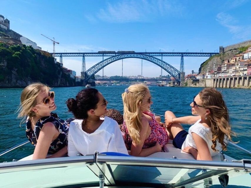 Porto: Douro River Boat Tour w/ Portuguese Wines & Tasting - A slow cruise with Porto and Gaia in view