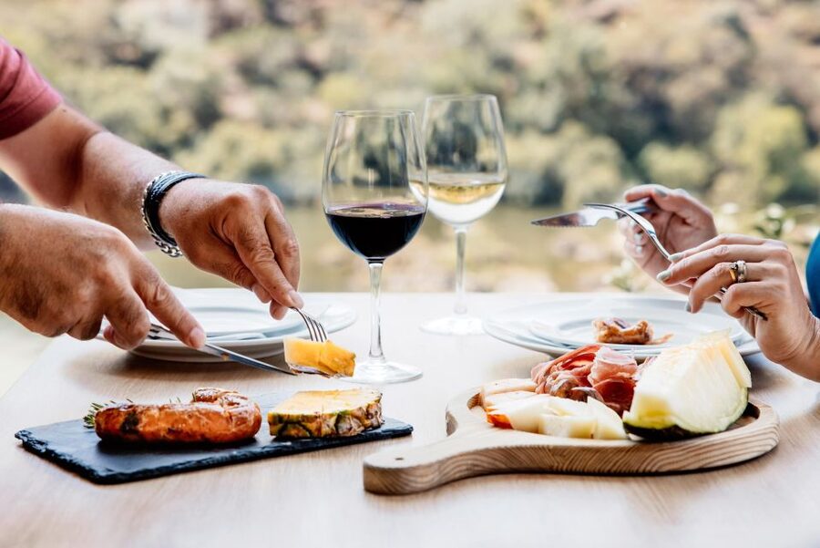 Porto: Douro Valley Full-Day Boat, Train, and Lunch Tour - The boat from Pinhão, with Port and open valley views