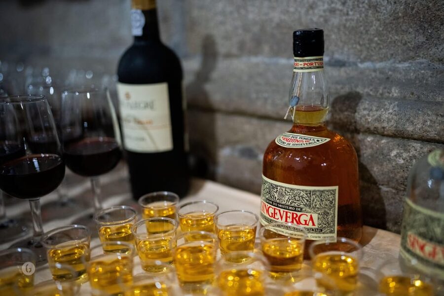 “Porto: Fado Show with Guided Tour in a Historic Monastery” - Port wine during the performance