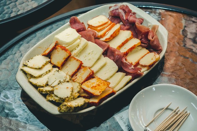 Porto Food and Local Drinks Evening Tour by Food Lover Tour - Francesinha, bifana, fish, and the shape of a full meal