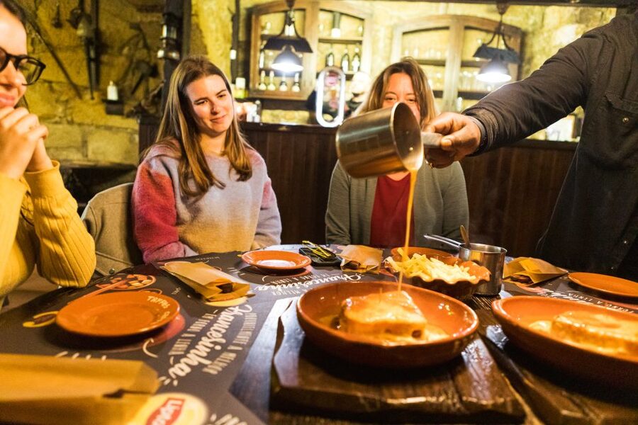 Porto: Food & Wine Tasting Walking Tour with Port Wine Cave - Five food stops, from Bispo to Bacalhau