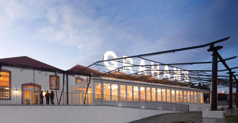Porto: Graham's Port Lodge Tour & Vintage Room Wine Tasting - Inside a cellar with 2,000 oak pipes