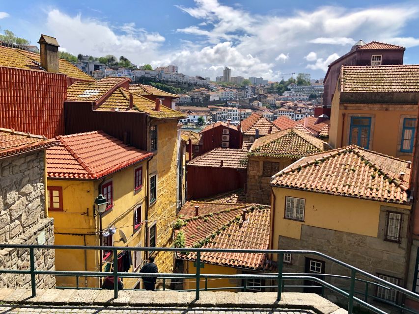 Porto: Guided City Walking Tour & Port Wine Cellar - Crossing into the Port wine cellars