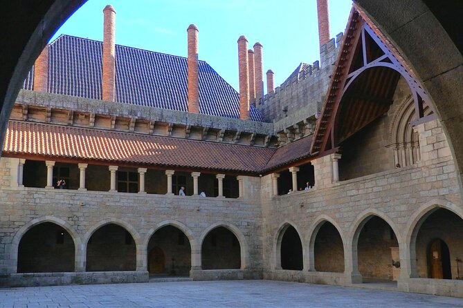 Porto: Guimaraes & Braga Small Group Tour with Lunch and Tickets - Guimarães Castle and the origins of Portugal