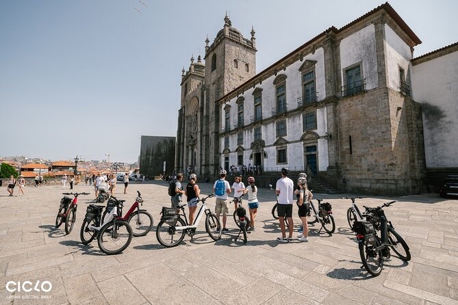 Porto Highlights in 3 Hours E-Bike Tour - Historical, Sightseeing - Clérigos Tower from street level