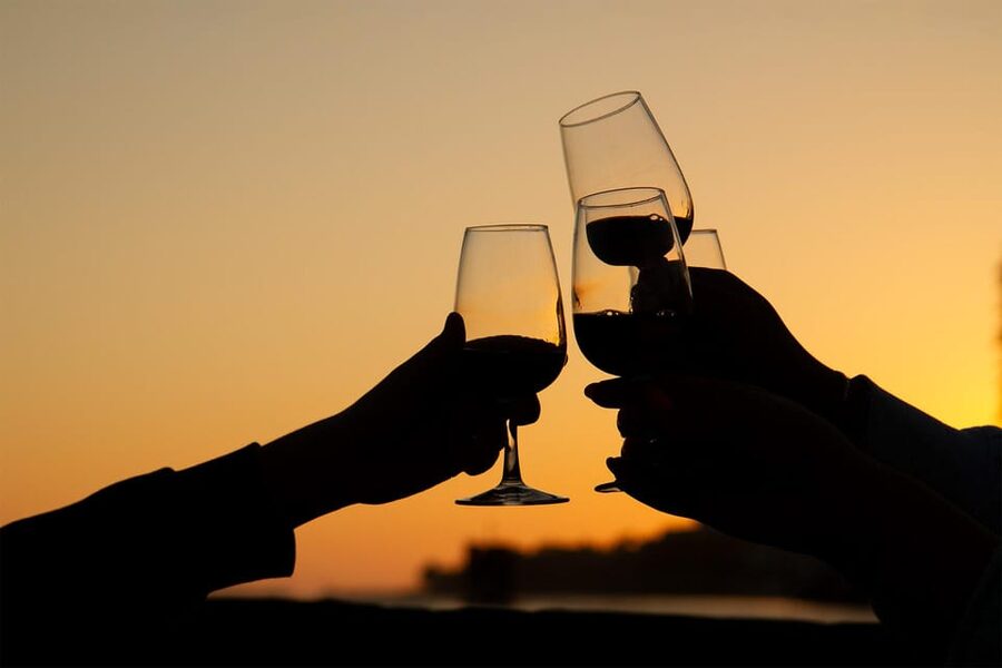 Porto: Port Wine Sunset Boat Tour - Cruising west toward Foz do Douro