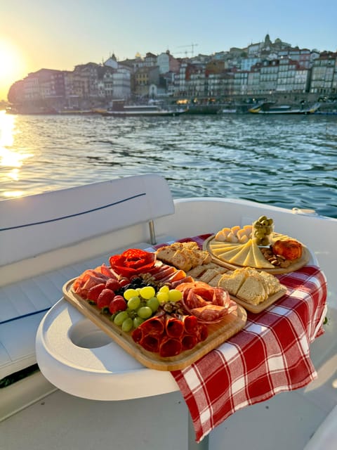 Porto: Private Douro River Bridges Cruise with Food & Wine - Setting off with a drink and a river view