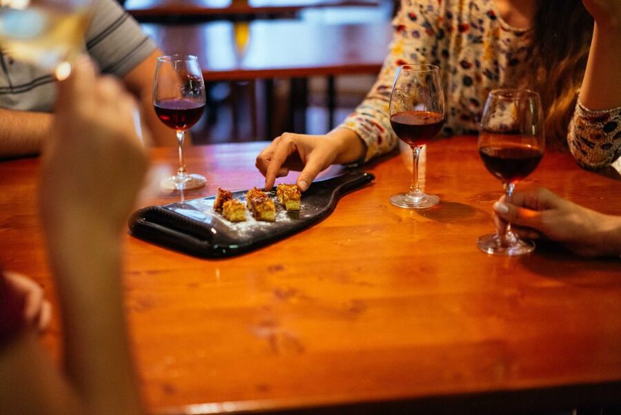 Porto: Private Evening Tour with Drinks & Bites - What the guide adds between the bars