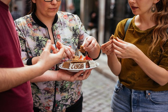 Porto Private Food and Drink Tasting Tour with Local - Porto landmarks between the food stops