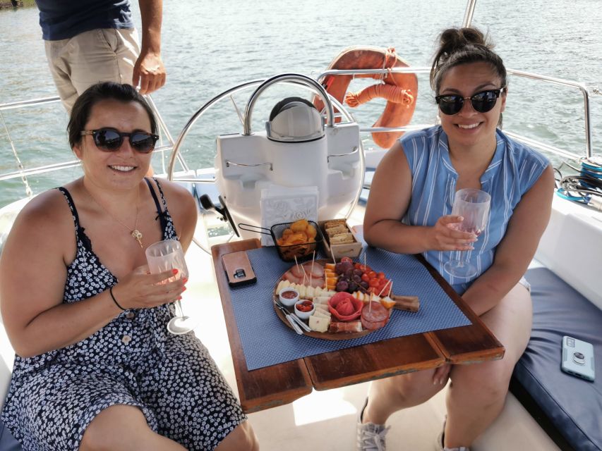 Porto: Private Sailboat Trip with Wine Tasting & Charcuterie - A tasting board near the Dom Luís I Bridge