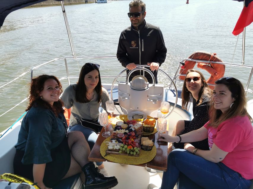 Porto: Private Sailboat Trip with Wine Tasting & Charcuterie - The first wine after the Arrábida Bridge
