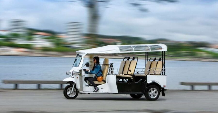 Porto: Private Sightseeing Tour by Electric Tuk Tuk - Ribeira, the Douro, and the bridge crossing