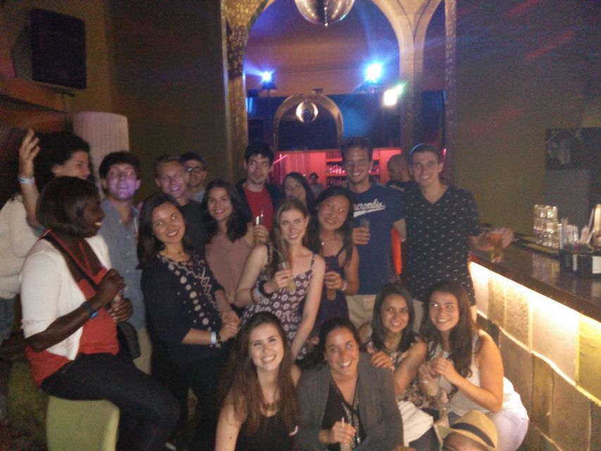 Porto: Pub Crawl with 6 Drinks and VIP Club Entry - The First Bar: Shots, Beer, and Sangria