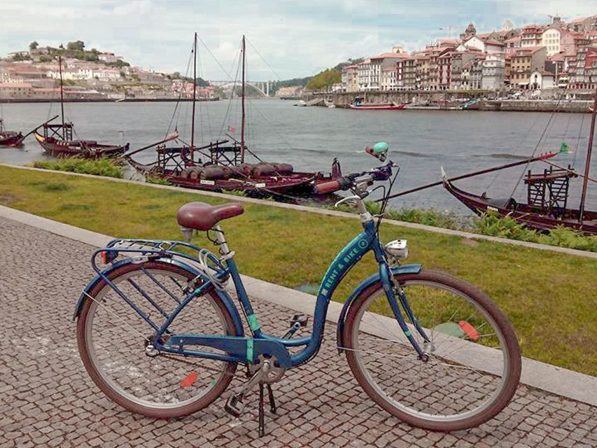 Porto: Self-Guided Bike and Boat Tour with Port Wine Tasting - Seeing Porto and Gaia from a rabelo boat