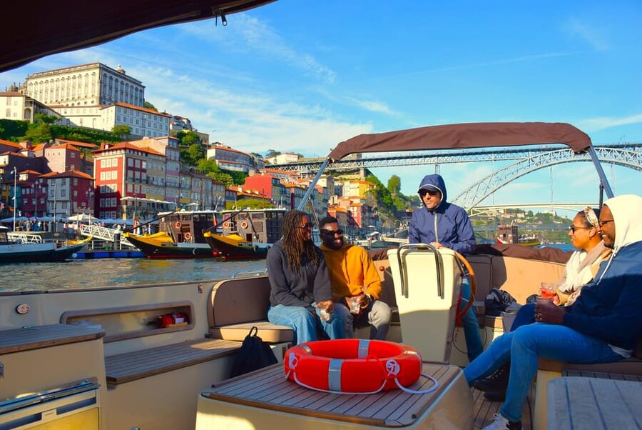 Porto: Six Bridges Douro River Cruise with Drinks - Port tasting on a moving boat