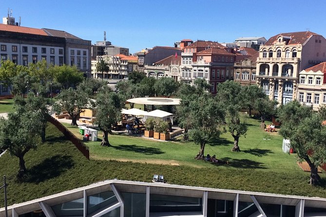 Porto Small Group Walking Tour with Lello Bookshop - Walking down through medieval Ribeira