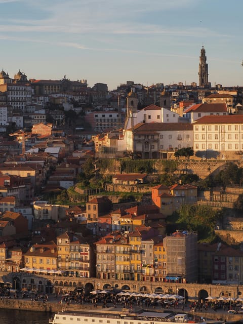 Porto: Sunset Walking Tour with Port Wine Tasting - Walking through Porto’s historic quarters