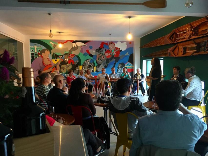 Porto: The Authentic Fado Concert with Port Wine - A glass of Poças Port with the music