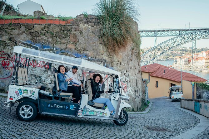 Porto Tuk Tuk: Clérigos, Seaside & Viewpoints - with Options - Palácio da Bolsa and Porto’s grand civic center