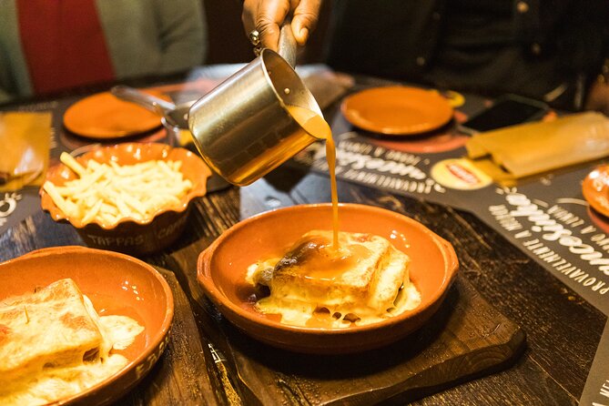 Porto Wine & Dine: Port Wine Cave Food Tour with Eating Europe - Bacalhau, local flavor, and a fair warning
