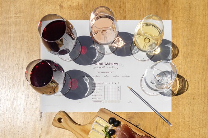 Porto Wine Tasting Experience with Portuguese Tapas Plate - White Port with cheese, ham, biscuits, and jam