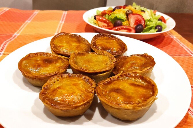 Portuguese Cooking Class in Porto with a Professional Chef - Sitting down for a three-course home-cooked meal