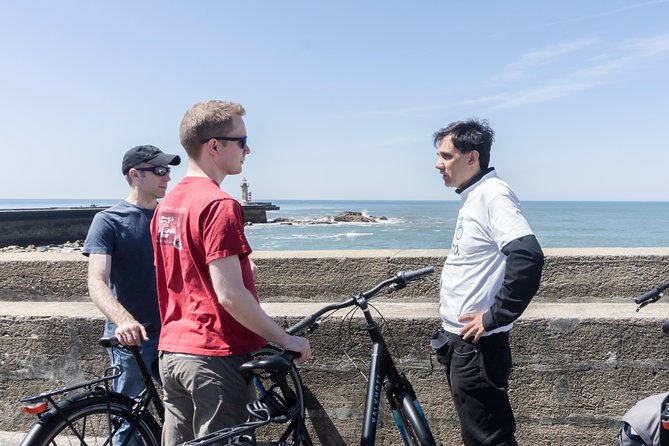 Private e-Bike Tour in Porto – Explore Riverside, Beaches & Parks - Beneath Arrábida Bridge and toward Cantareira