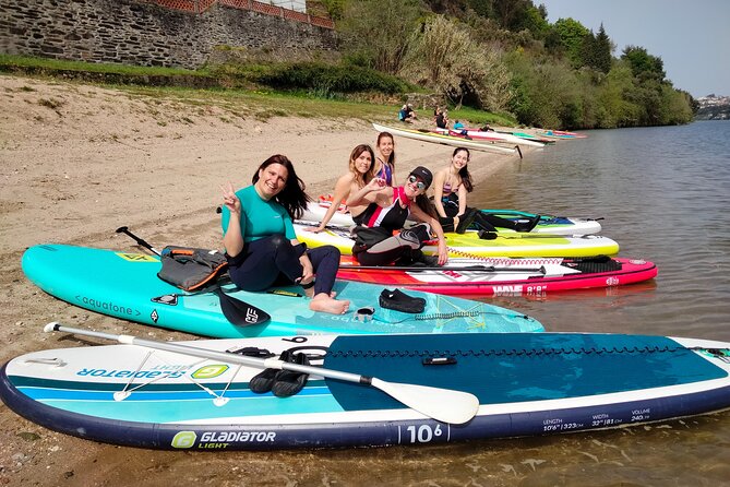Stand Up Paddle discovering desert beaches of Douro River - Pick Up included - Equipment, instruction, and what the $71.04 price covers