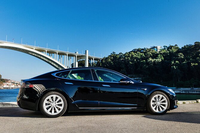 Tesla S Luxury Executive Porto Airport Transfer - A Tesla pickup at Porto Airport